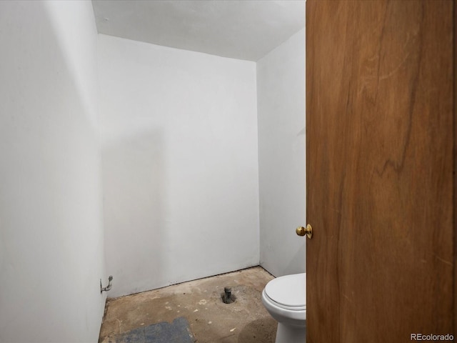 3134 W Center Ave, Denver, CO 80219 - bathroom with toilet and unfinished concrete flooring