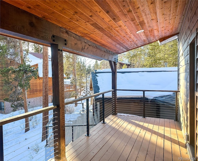 view of snow covered deck