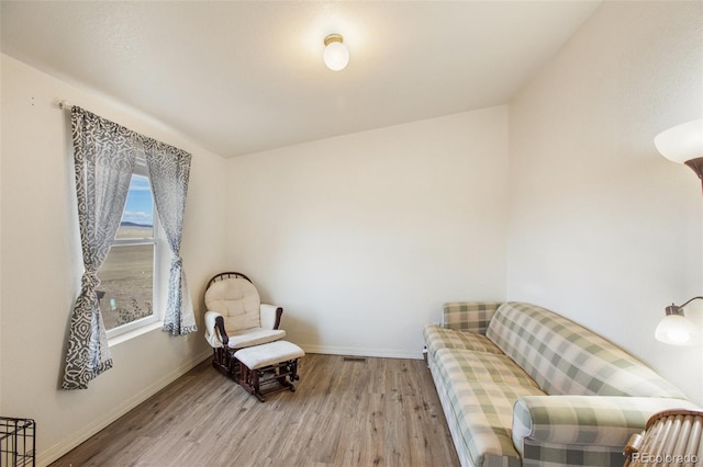 sitting room featuring light wood-type flooring