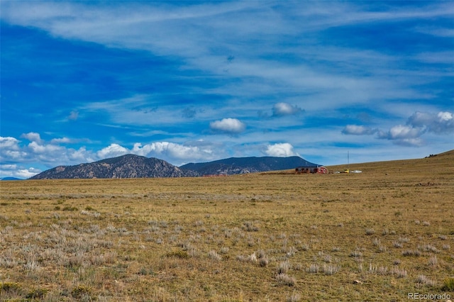 property view of mountains with a rural view