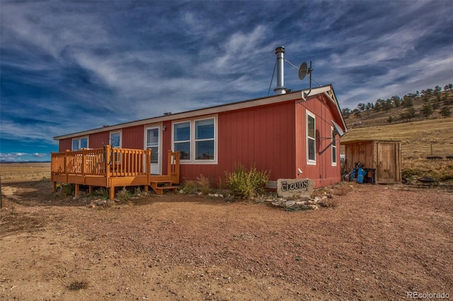 view of front of house featuring a deck