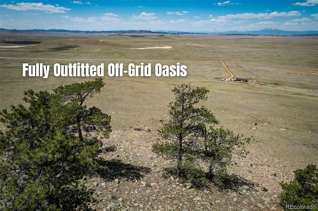 1888 Lakeview Dr, Lake George, CO 80827 - aerial view of sparsely populated area with a mountain backdrop