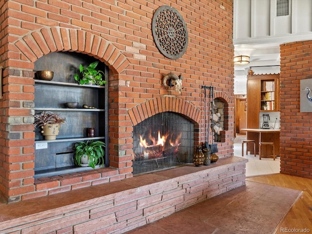 10400 W 35th Pl, Wheat Ridge, CO 80033 - detailed view of wood finished floors, a fireplace, and built in features