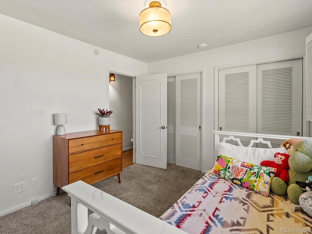 10400 W 35th Pl, Wheat Ridge, CO 80033 - carpeted bedroom with multiple closets