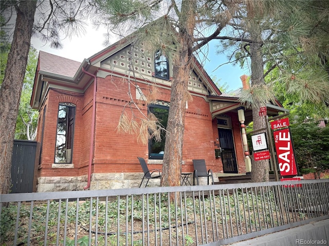 3259 W Hayward Pl, Denver, CO 80211 - view of side of property with brick siding