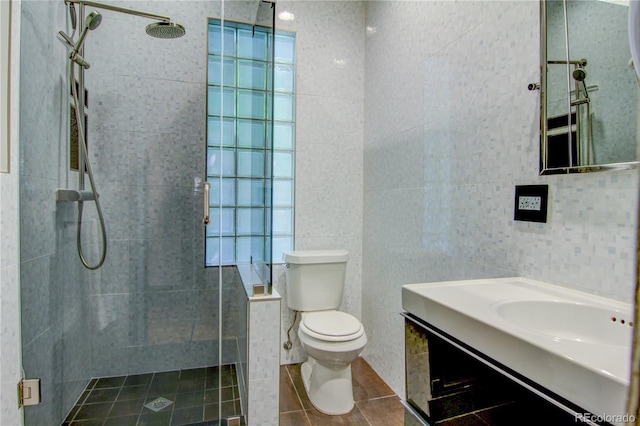 3259 W Hayward Pl, Denver, CO 80211 - full bath with tile walls, a shower stall, vanity, and tile patterned flooring