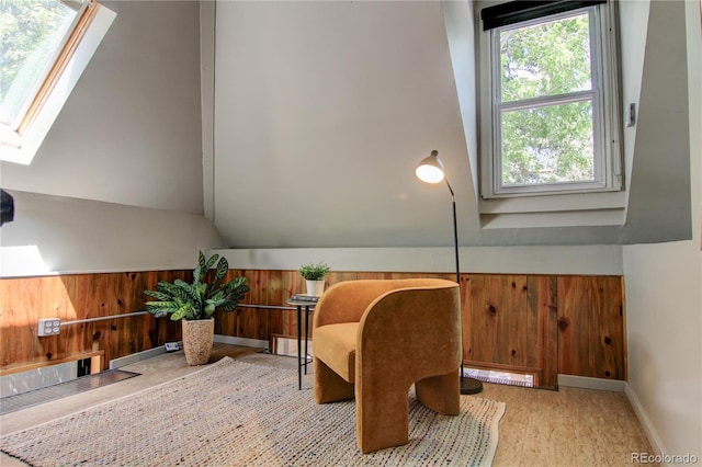 3259 W Hayward Pl, Denver, CO 80211 - sitting room with a skylight, lofted ceiling, and wood walls