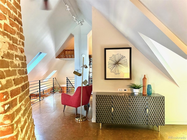 3259 W Hayward Pl, Denver, CO 80211 - sitting room with a skylight, rail lighting, and lofted ceiling