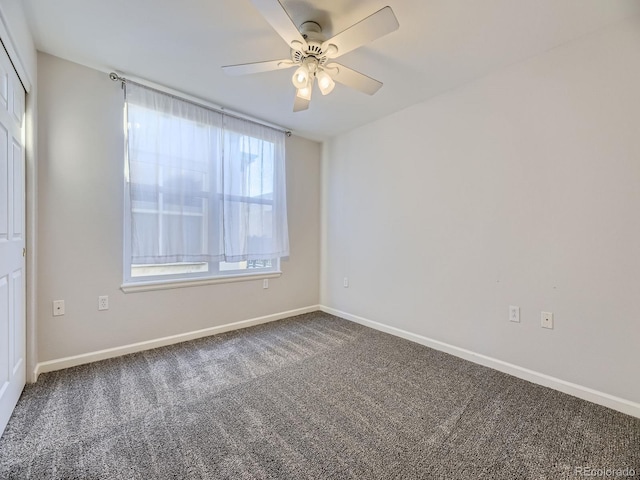 unfurnished room featuring carpet floors and ceiling fan