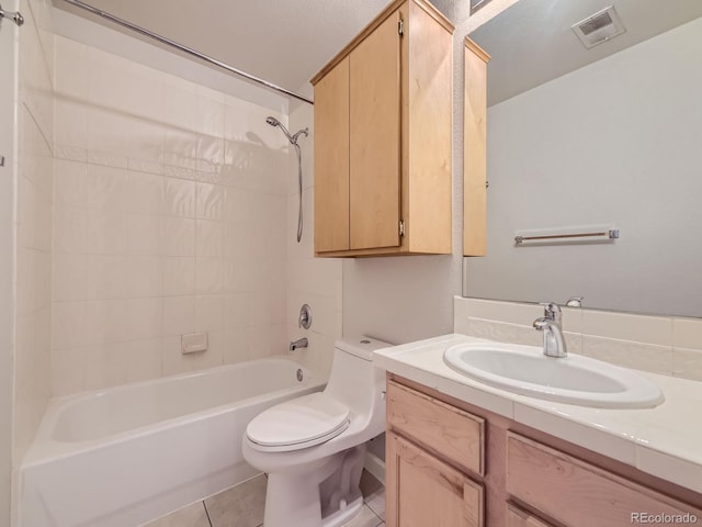 full bathroom with tile patterned floors, vanity, shower / bathtub combination, and toilet