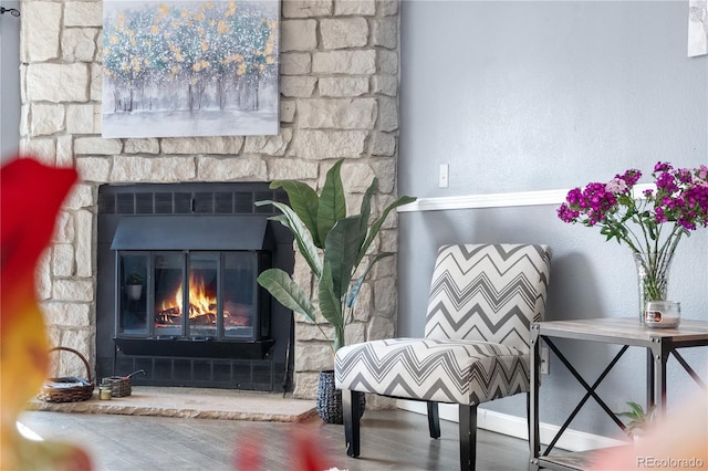 10819 Summerset Way, Parker, CO 80138 - living area featuring wood finished floors and a glass covered fireplace
