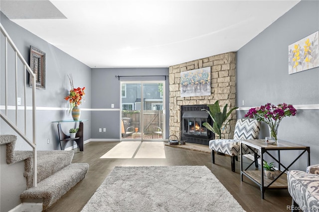 10819 Summerset Way, Parker, CO 80138 - living room with wood finished floors, stairway, and a large fireplace