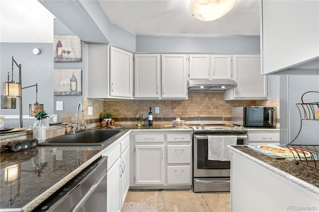 10819 Summerset Way, Parker, CO 80138 - kitchen with stainless steel appliances, under cabinet range hood, white cabinetry, and backsplash