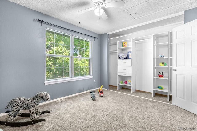 10819 Summerset Way, Parker, CO 80138 - playroom with carpet, a textured ceiling, and ceiling fan