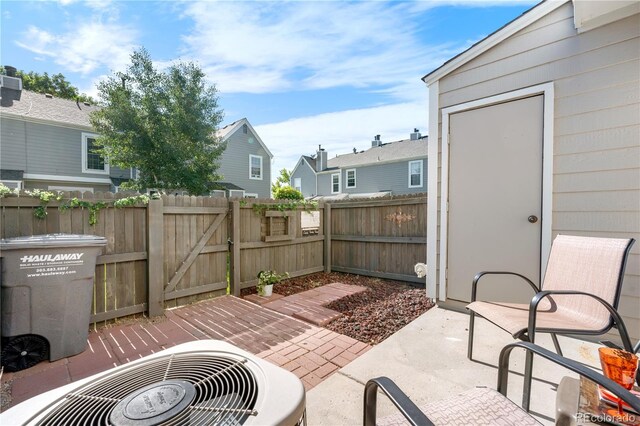 10819 Summerset Way, Parker, CO 80138 - view of patio / terrace featuring a gate and a residential view