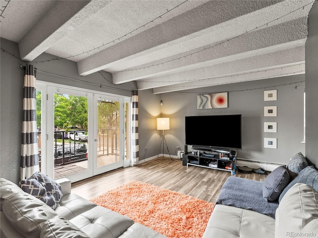 100 S Clarkson St Unit 202, Denver, CO 80209 - living area featuring beamed ceiling, french doors, wood finished floors, and a baseboard heating unit