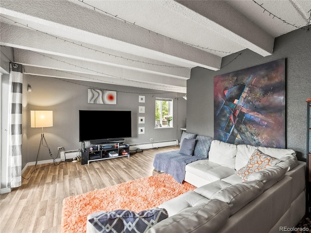 100 S Clarkson St Unit 202, Denver, CO 80209 - living area with a baseboard heating unit, wood finished floors, beamed ceiling, and a textured ceiling