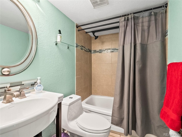 100 S Clarkson St Unit 202, Denver, CO 80209 - bathroom with a textured wall, shower / tub combo, and a textured ceiling