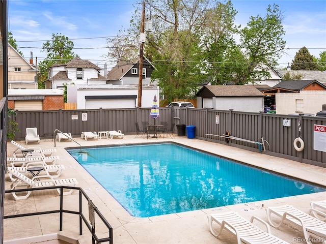 100 S Clarkson St Unit 202, Denver, CO 80209 - community pool with a patio area and a residential view