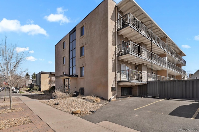 100 S Clarkson St Unit 202, Denver, CO 80209 - view of apartment building / complex with uncovered parking