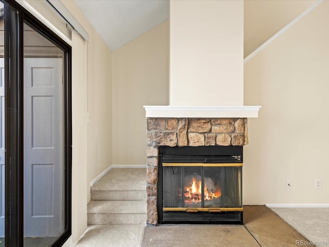 interior details featuring carpet flooring and a fireplace