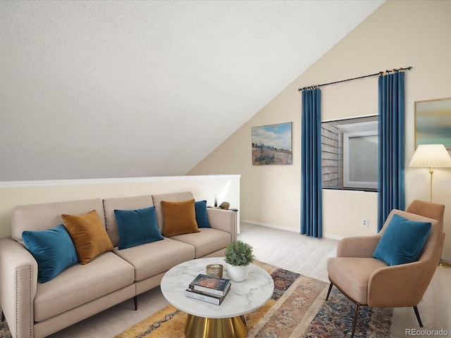 living room with vaulted ceiling and baseboards