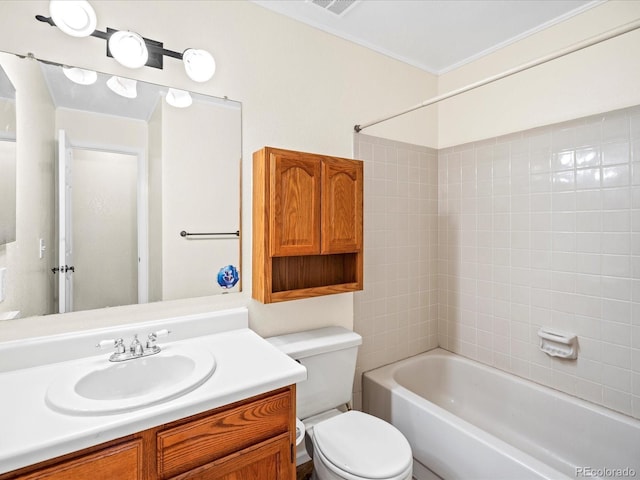 bathroom with shower / bathtub combination, vanity, and toilet