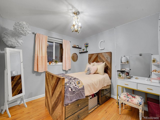 bedroom with light hardwood / wood-style flooring