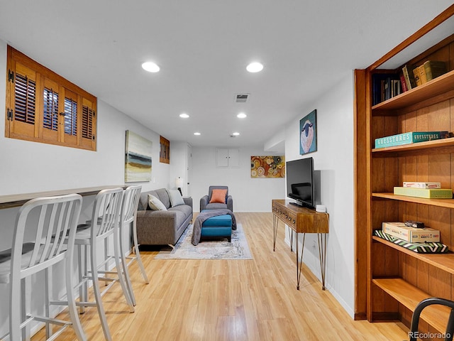 living room with light hardwood / wood-style floors