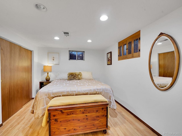 bedroom featuring light hardwood / wood-style floors