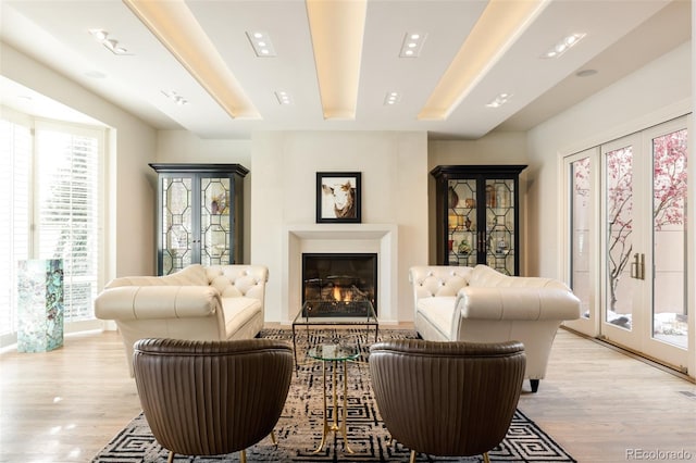 sitting room with light hardwood / wood-style floors