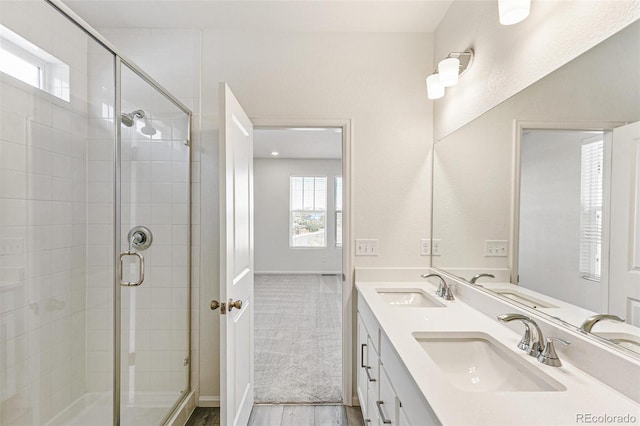 bathroom with a sink and a wealth of natural light