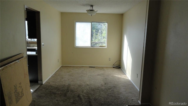 6815 Hills Dr, Parker, CO 80138 - empty room featuring carpet floors and baseboards