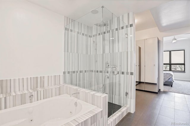 bathroom featuring separate shower and tub and tile patterned floors