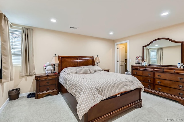 carpeted bedroom featuring visible vents, baseboards, and recessed lighting