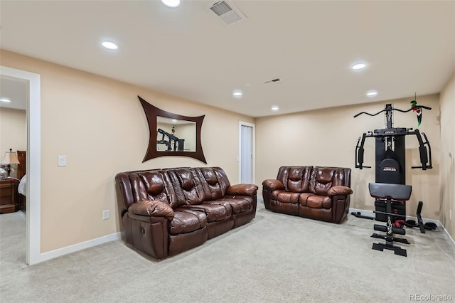 carpeted living room with recessed lighting, visible vents, and baseboards
