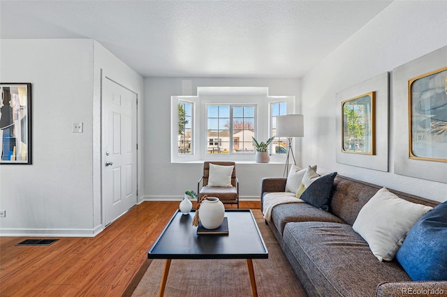4740 Milwaukee St, Denver, CO 80216 - living area with wood finished floors and baseboards