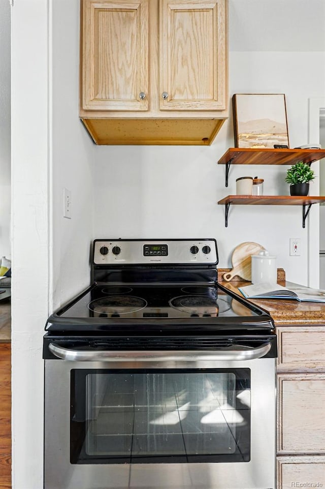 4740 Milwaukee St, Denver, CO 80216 - kitchen with electric stove, open shelves, and light brown cabinets