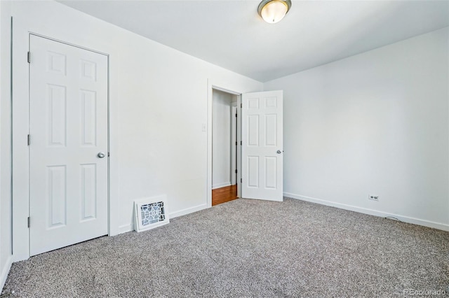 4740 Milwaukee St, Denver, CO 80216 - unfurnished bedroom with carpet flooring and baseboards