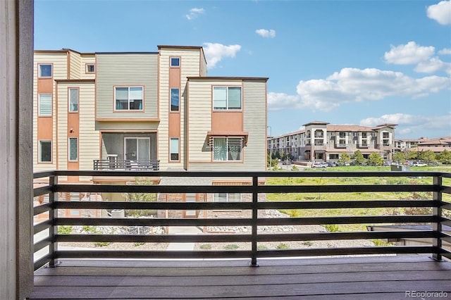 balcony featuring a residential view