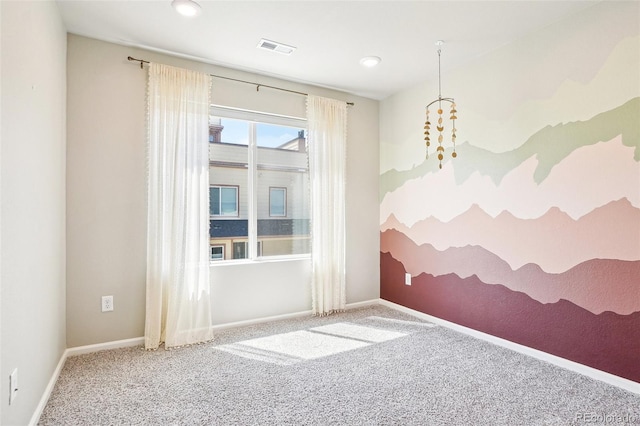 spare room featuring carpet, baseboards, and recessed lighting