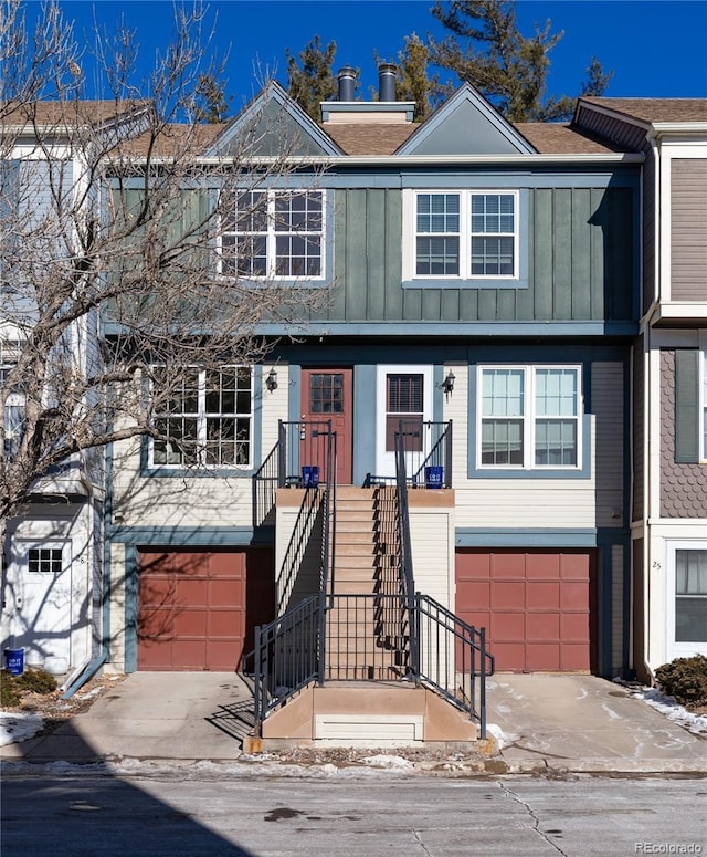 townhome / multi-family property featuring a garage