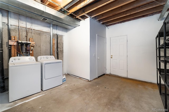 basement featuring separate washer and dryer