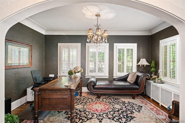 615 N Williams St, Denver, CO 80218 - home office featuring arched walkways, a textured wall, wood finished floors, ornamental molding, and a chandelier