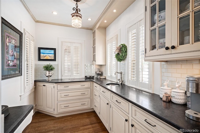 615 N Williams St, Denver, CO 80218 - kitchen with dark countertops, decorative backsplash, hanging light fixtures, dark wood-style floors, and recessed lighting