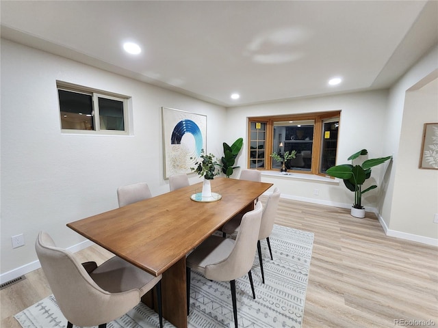 dining room with light hardwood / wood-style floors