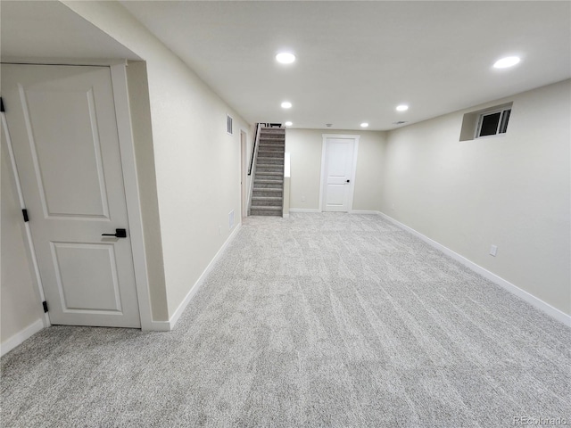 basement with light carpet