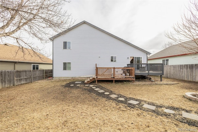 rear view of house with a deck