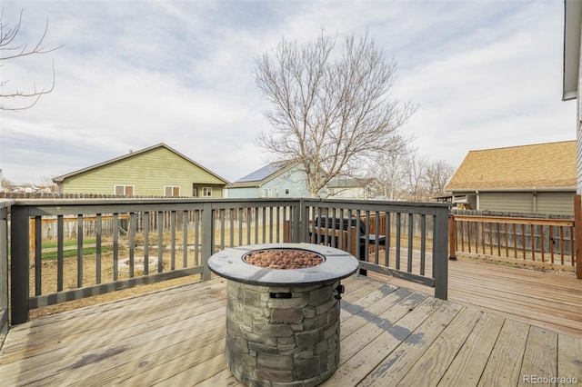 deck with a fire pit