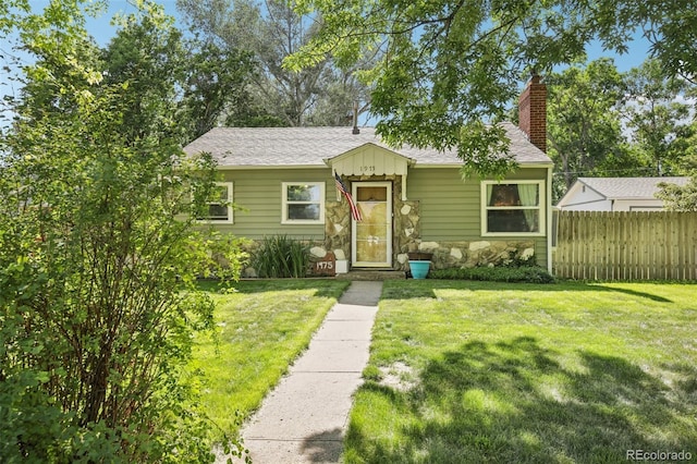 1975 Cody St, Lakewood, CO 80215 - bungalow-style home with a chimney and stone siding